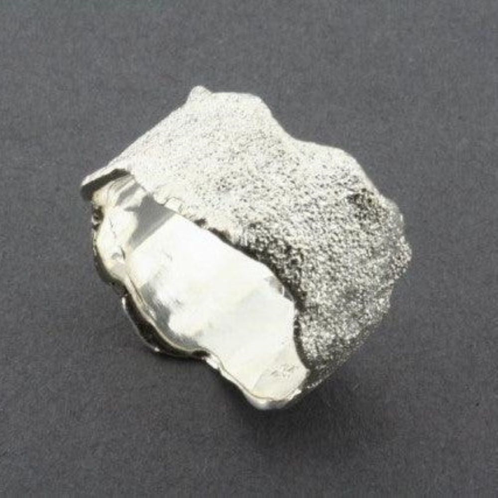 Ring | Textured torn band | Silver