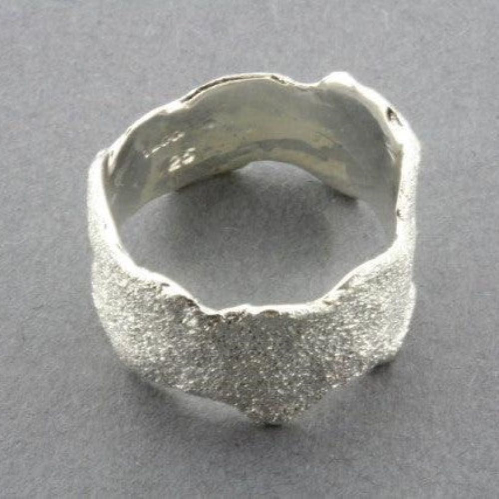 Ring | Textured torn band | Silver