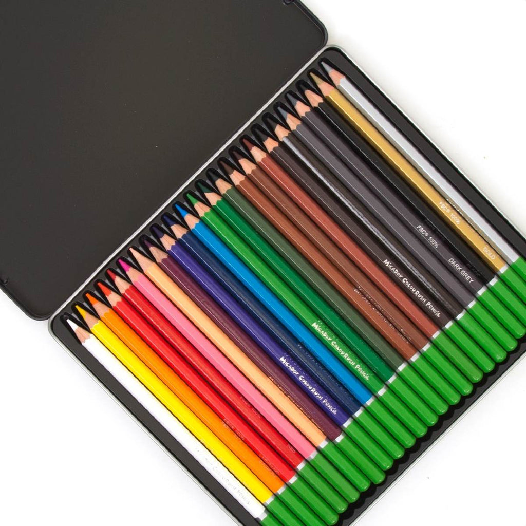 A flat black tin case opened to showcase the 24 colour pencils inside arranged in a rainbow order. 