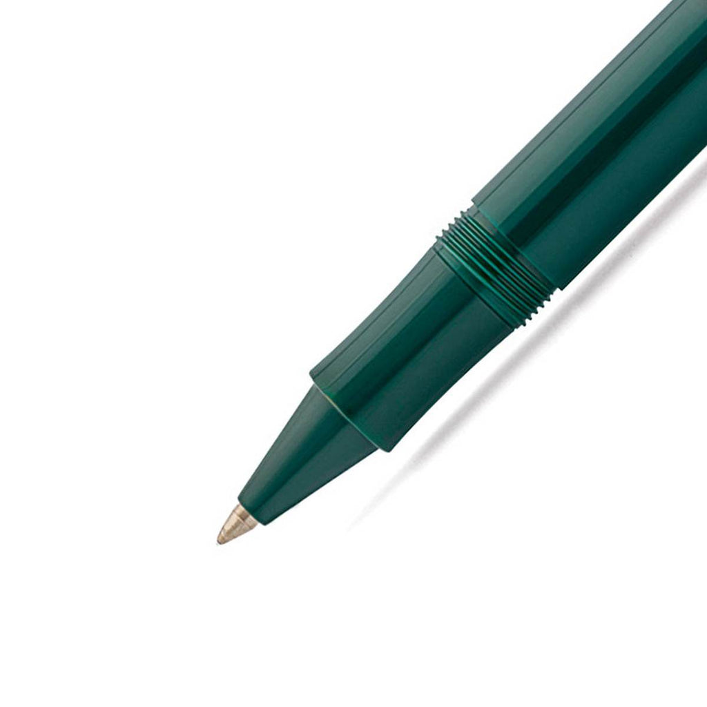 A close up of the gold rollerball nib is attached to the shiny emerald green pen barrel. 