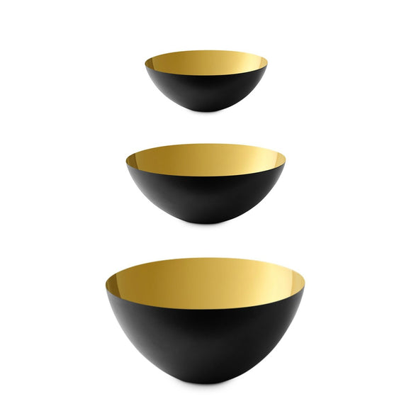 A deep Krenit bowl with a matte outer surface and a reflective gold surface inside. 