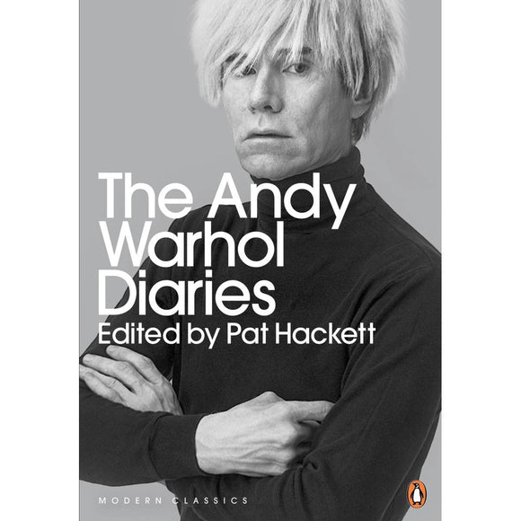 A book cover with a cover photograph of Andy Warhol, posed with his arms crossed.