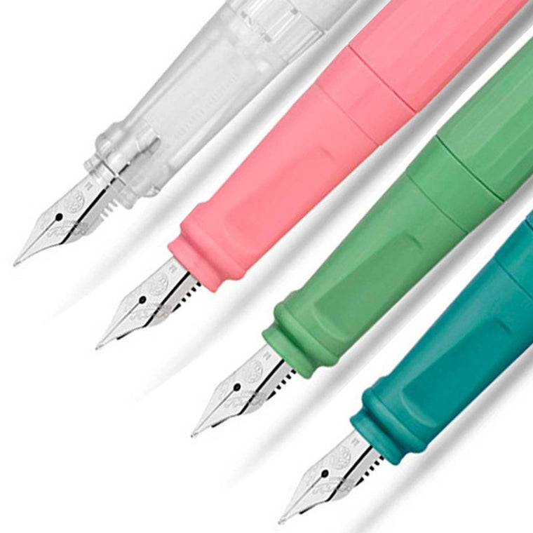 A close up of four fountain pen tips lined up showcasing the silvertip nib on a translucent, pink, green and teal pen barrel. 