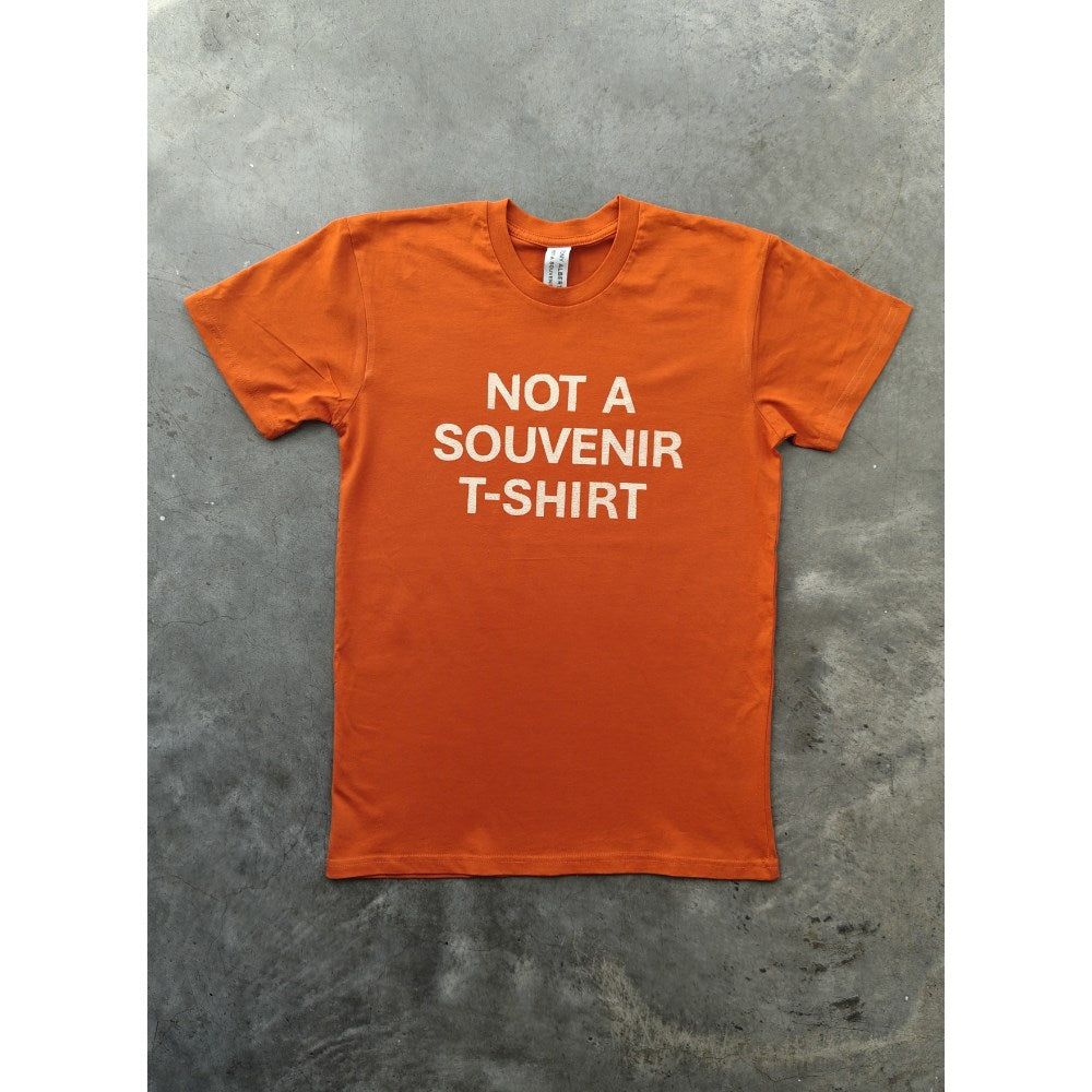 T-shirt | Not a Souvenir | Orange | Tony Albert | MCA