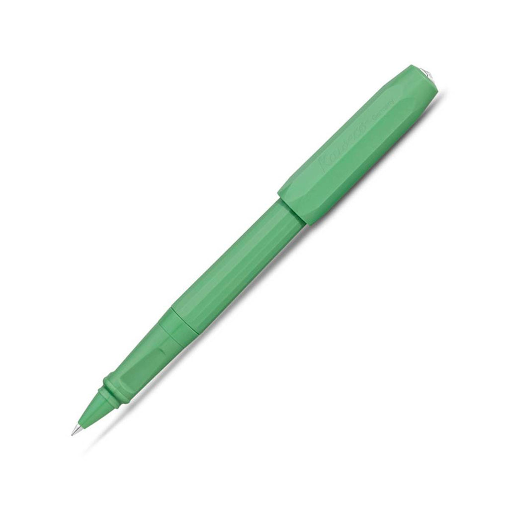 A matte green pen has a rollerball nib and a matching green cap secured on the other end.   