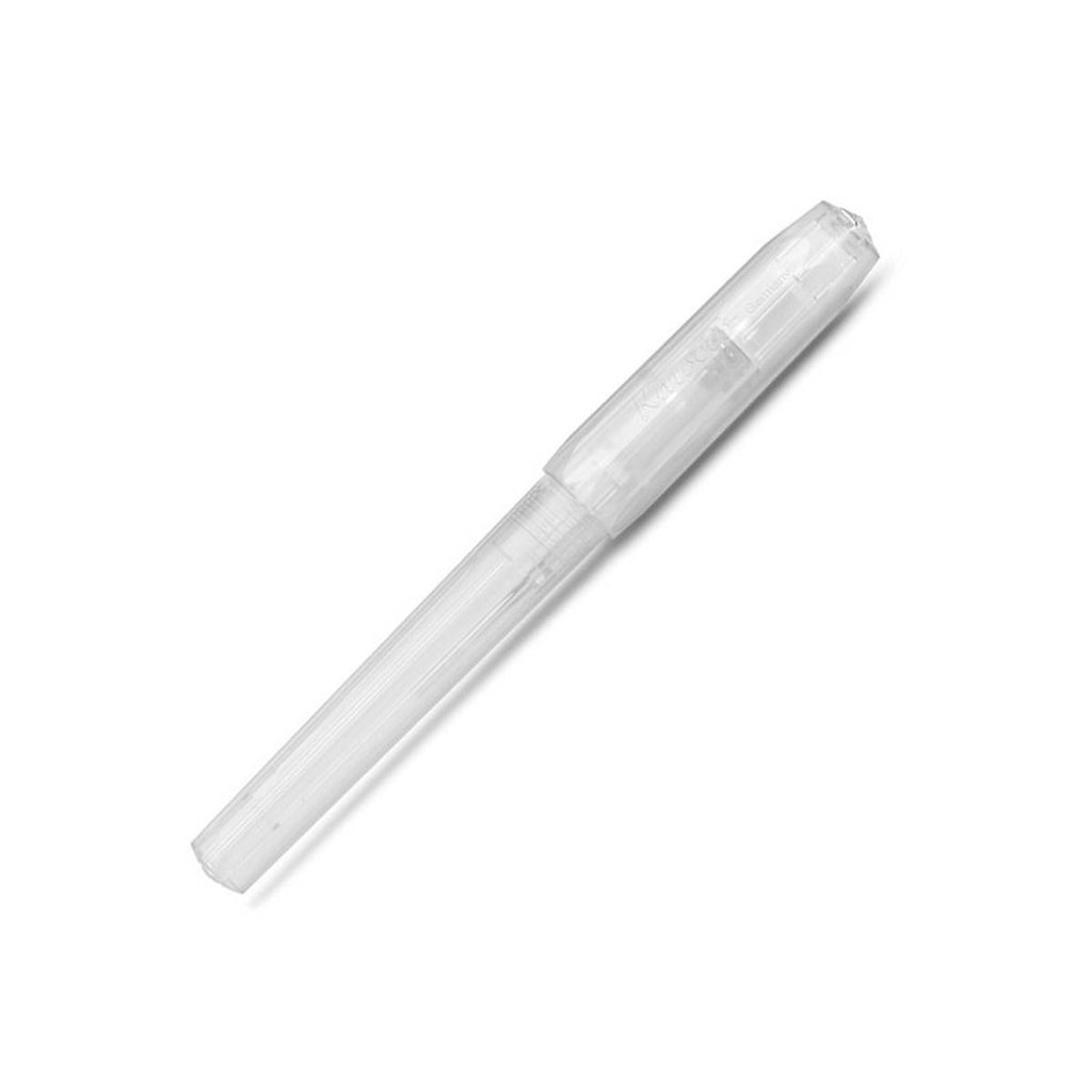 A matte translucent pen with its cap on has faceted sides. 