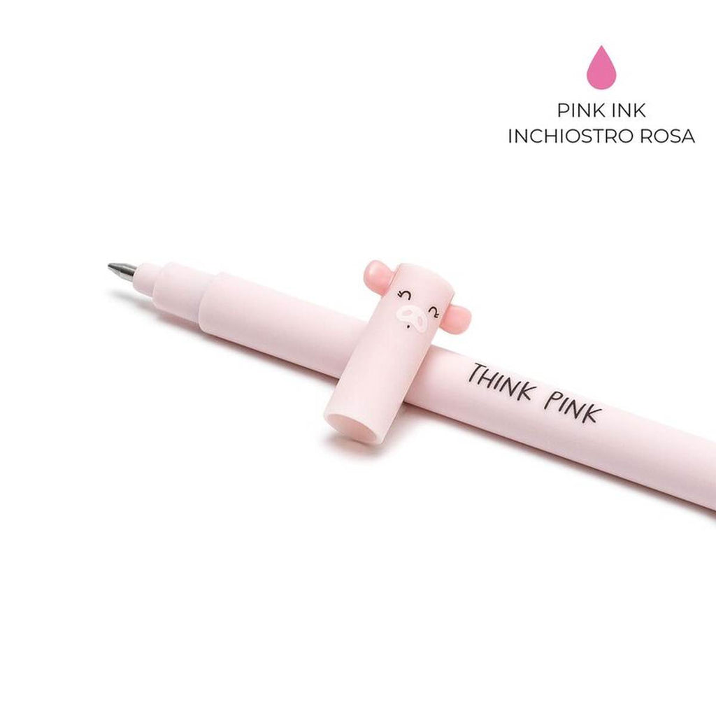 The pink cap with the pig face and ears on the tip laying against the pink pen and on the top right corner states "pink ink". 