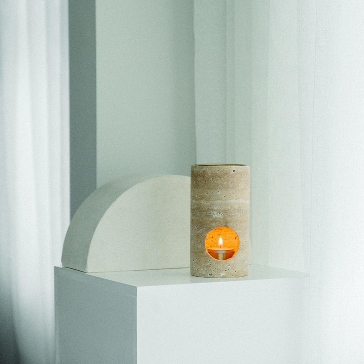 Oil burner | Addition Studio | travertine