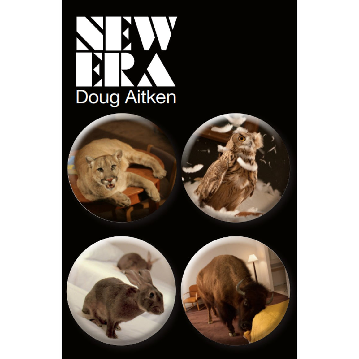 On a black packaging is four circular badges with a different photograph of an animal; a tigress, an owl, two rabbits, a Highland bull. Above the badges on the top left corner is "new era", capitalised in white block font with "Doug Aitken" in sans-serif font below it. 