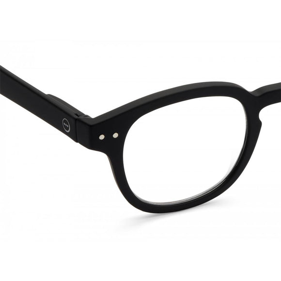 A black pair of magnifying reading glasses. The frames are an stylish, bold, square shape.