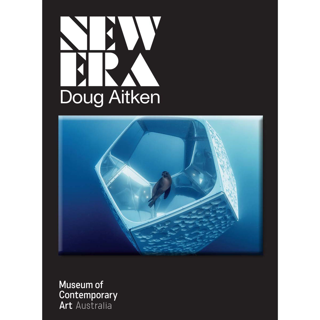 On a black packaging is a rectangle with a photograph of a grey seal swimming in front of a digital-augmented silver pentagonal ring in the deep blue sea. Above the magnet on the top left corner is "new era", capitalised in white block font with "Doug Aitken" in sans-serif font below it. 