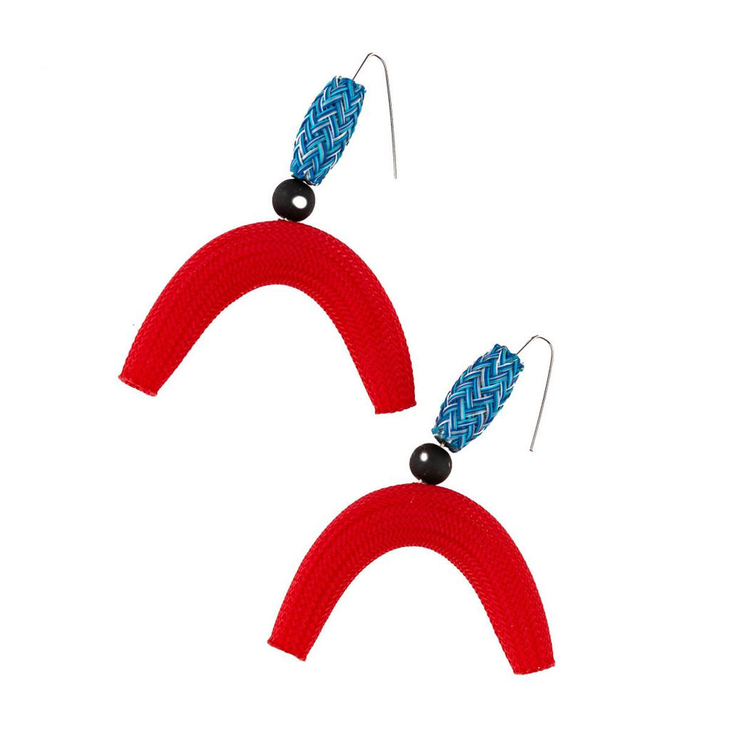 A pair of nylon mesh earrings featuring tube and semi-circle 'moon' shapes in red and blue