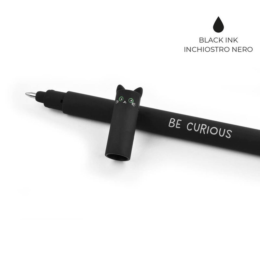 The black cap with a cat face and ears on the tip laying against the black pen and on the top right corner states "black ink".