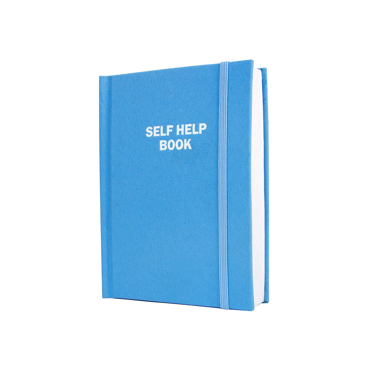 A blue book has a woven cover with "self help book" in white capitalised text bounded by a matching blue elastic band. 