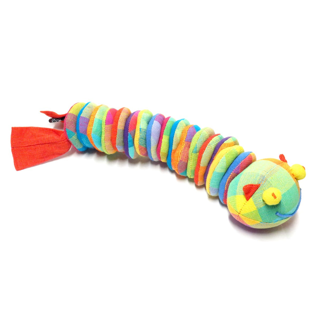 A bright colourful soft toy in the shape of a caterpillar or witchetty grub.