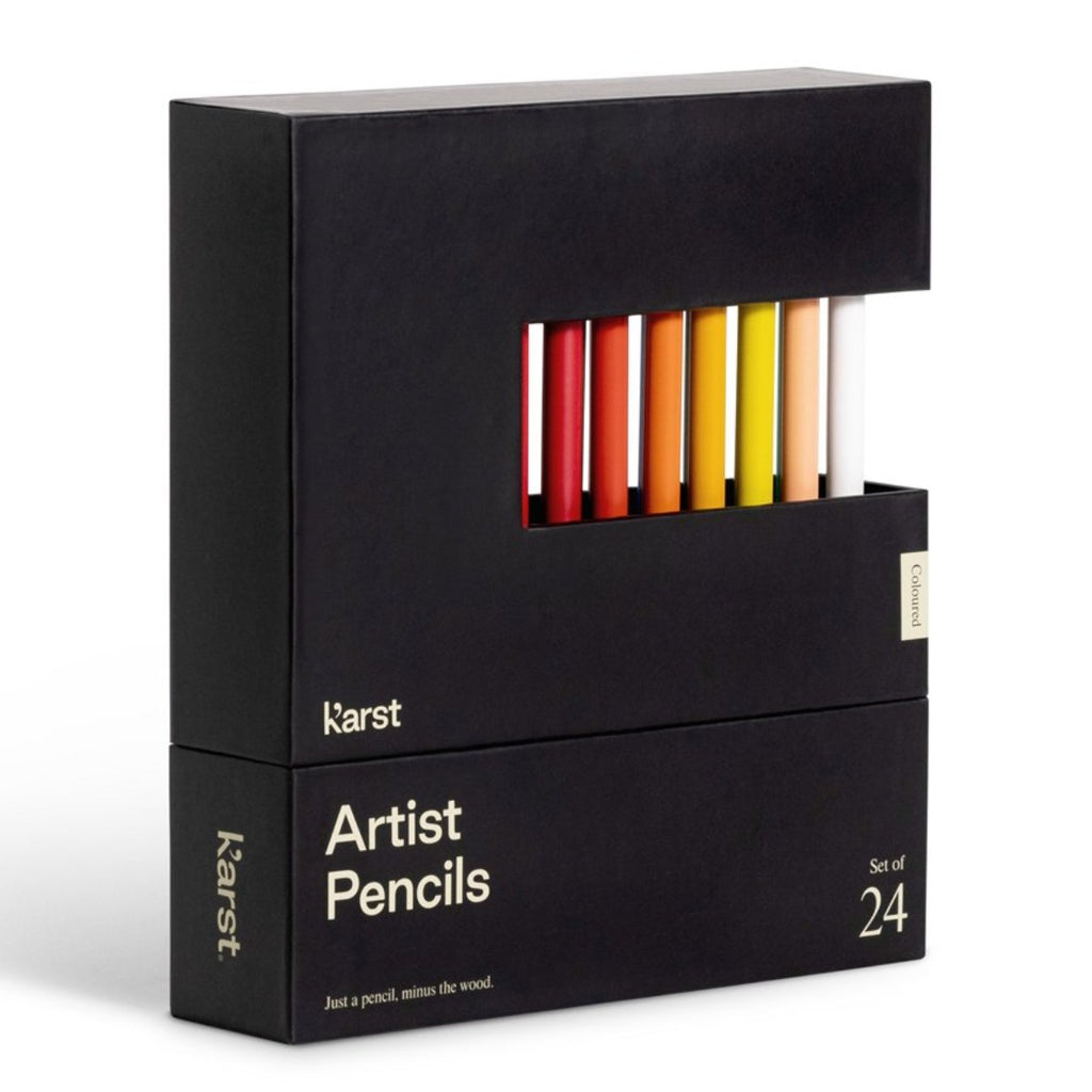 Image featuring a black box which has a slot that features a range of coloured pencils - includes the words: Karst: Artist Pencils, just a pencil, minus the wood - Set of 24 