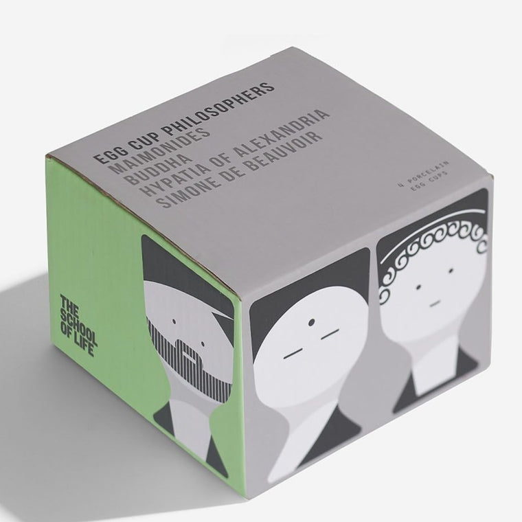Image featuring a grey and green box with the top of the box includes the words Egg cup Philosophers Maimonides, Buddha, Hypatia of Alexandria and Simone De Beauvoir - around the bottom half of the box features graphic illustrations of the listed Philosophers