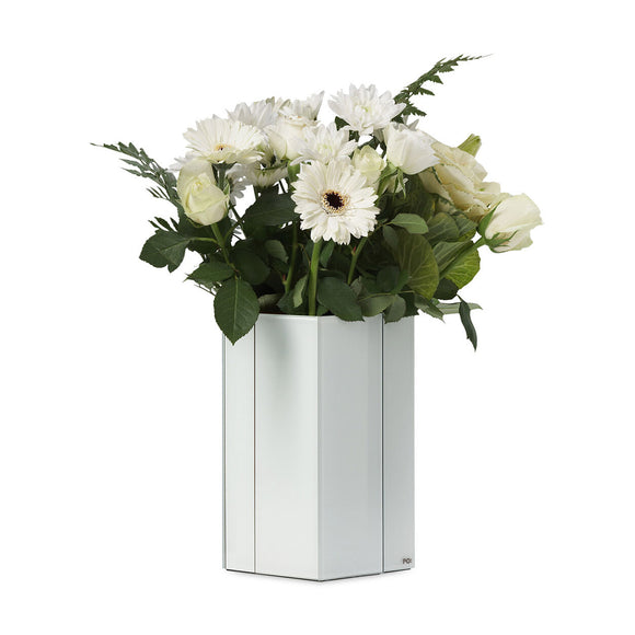 Image featuring the line up vase in it's two separate parts which both feature the colours black, blue, red, yellow and white