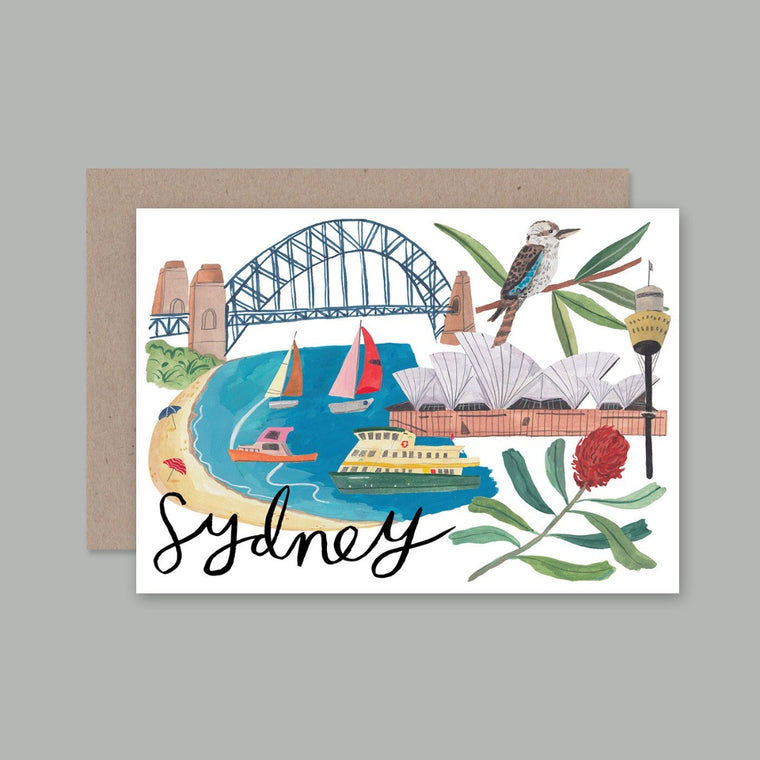 A6 greeting card with a white background including an illustration of the sydney harbour which includes the bridge, opera house, ferries, a kookaburra, waratah flower and the centrepoint tower - with the word sydney written on the left hand side