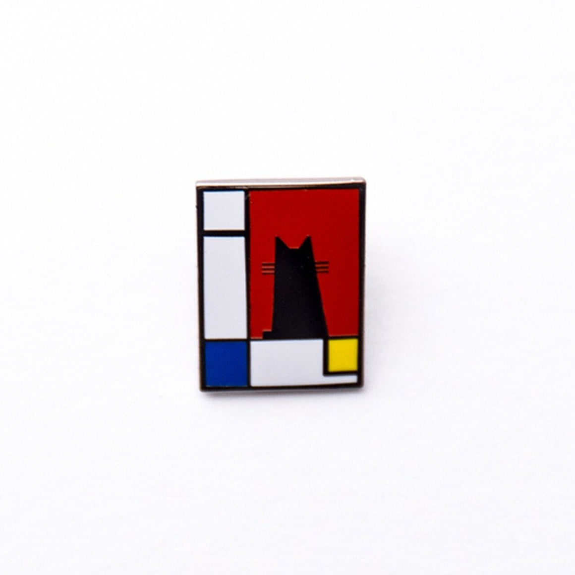 Image featuring an enamel pin in the center which has been inspired by the geometric abstract work of Mondrian, featuring his famous use of the colours red, white, blue and yellow 