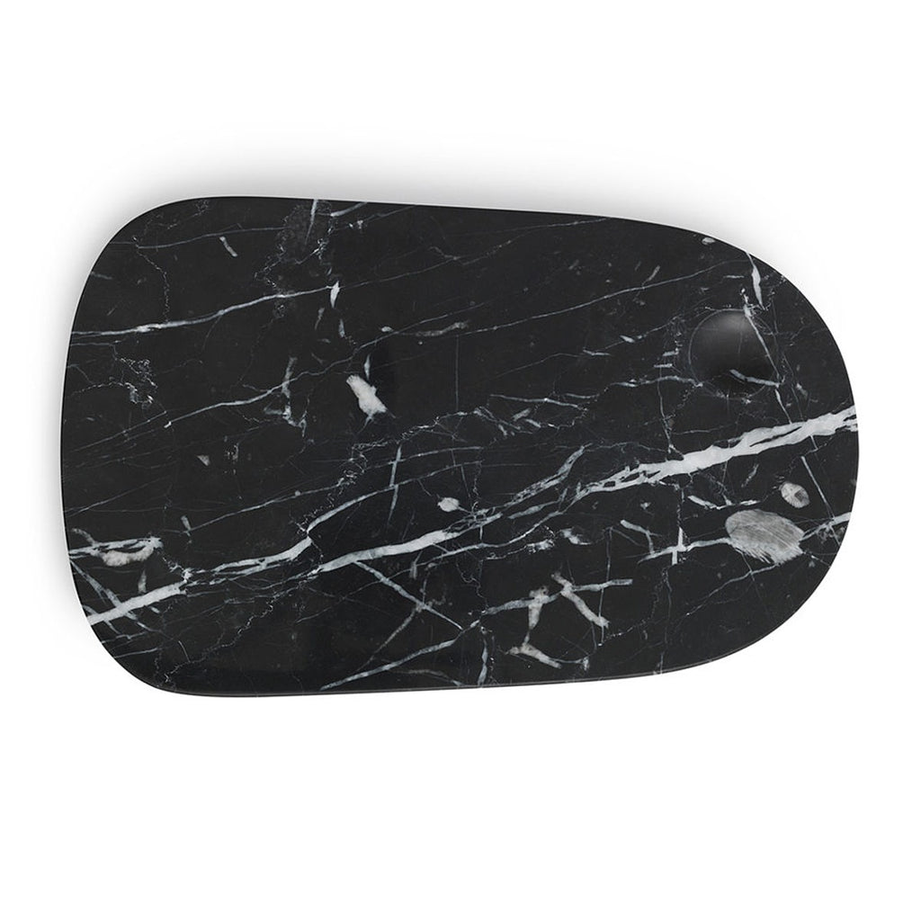 A rectangular serving board with curved corners on one end and the other being rounded is made of black marble with white veins crackle details.