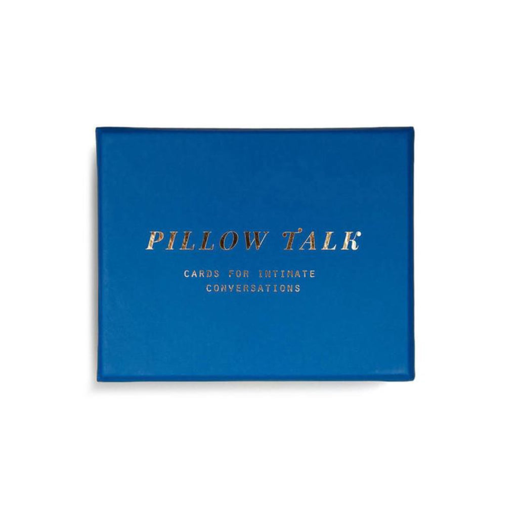 Image featuring the products packaging which includes a blue background with gold font in the centre featuring the words - Pillow Talk: Cards for Intimate Conversations