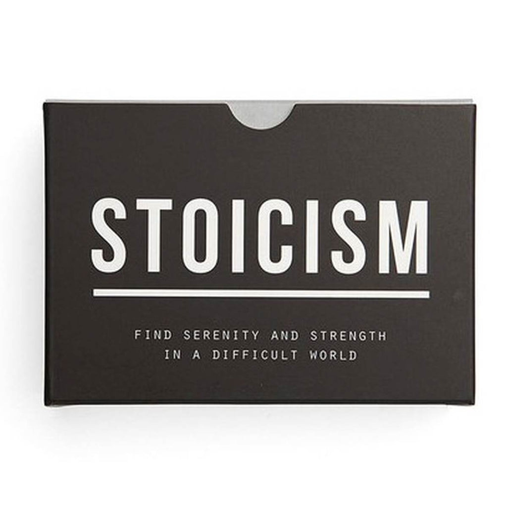 A black rectangular packaging box has 'Stoicism' underlined in large white font. Below is 'Find serenity and strength in a difficult world' capitalised in a fine white font. 