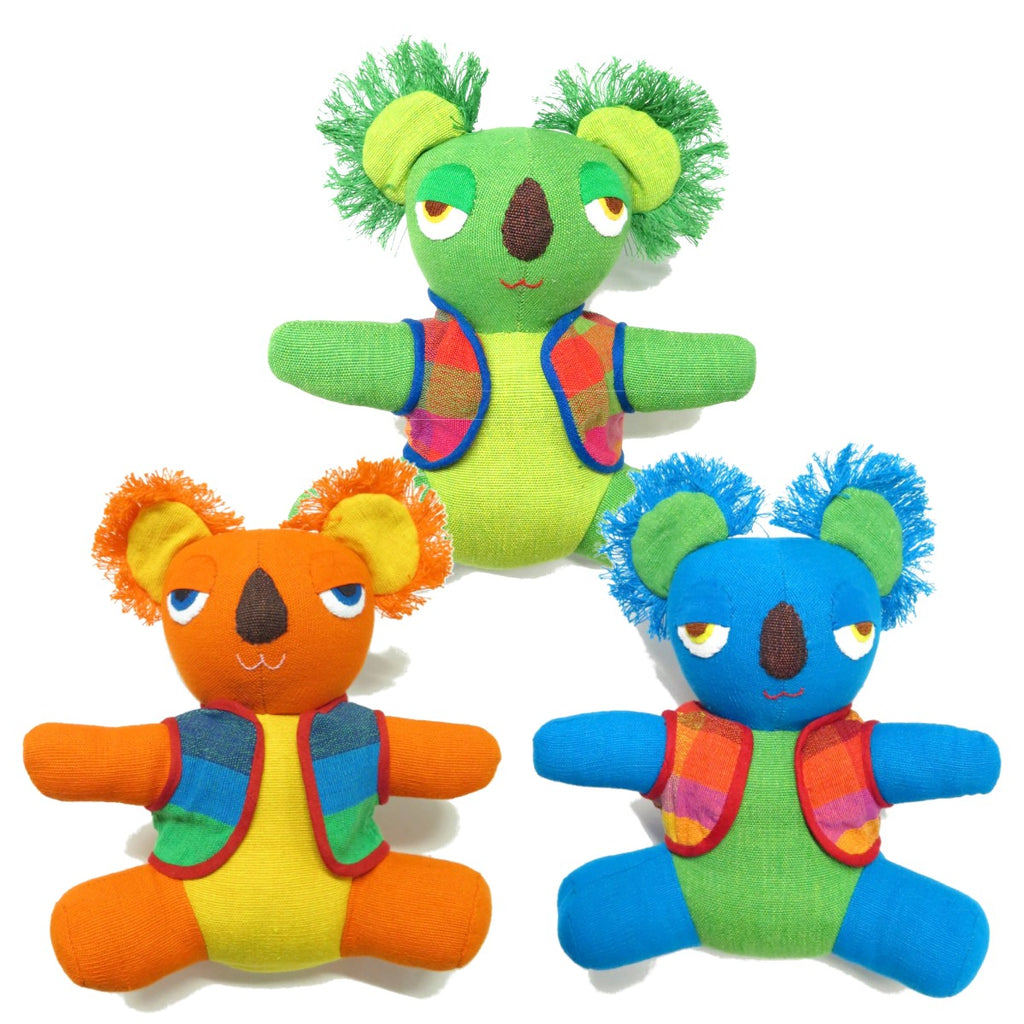 a group of three brightly coloured koala soft toys.