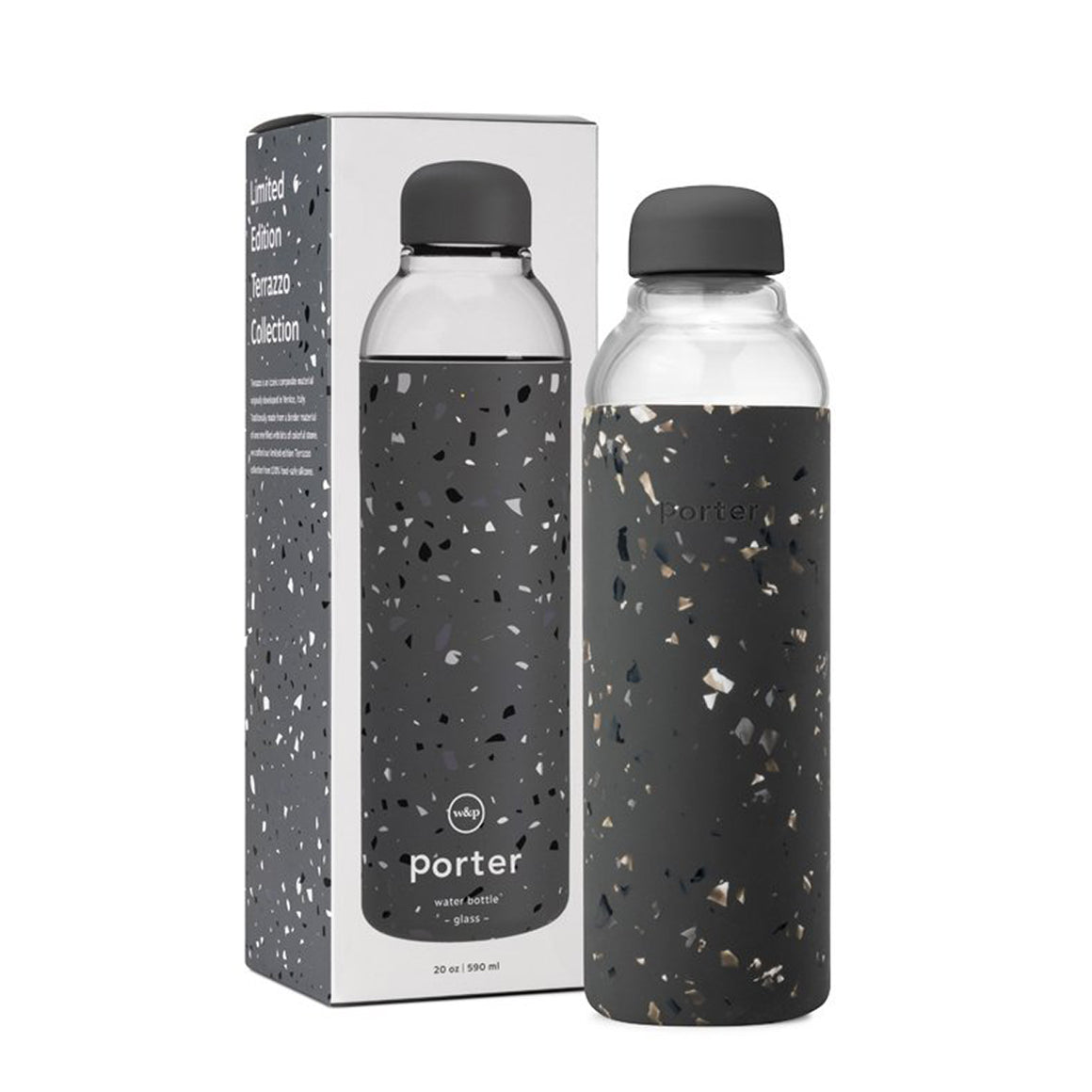 In front of a white and charcoal, tall packaging box is a cylindrical glass bottle with a terrazzo grey silicone sleeve and a grey curved lid. 