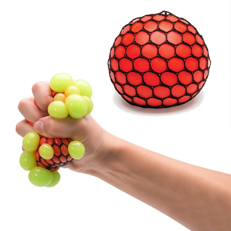 An Atomic Stress Ball in red. A Hand squeezes it, showing how it changes colours to yellow