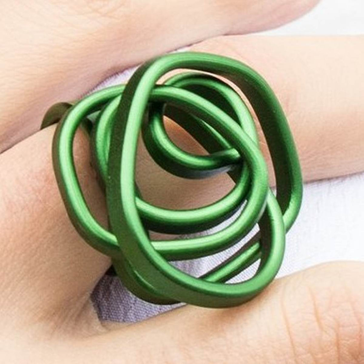 Ring | Fine knot | aluminium | blue, green & purple tones