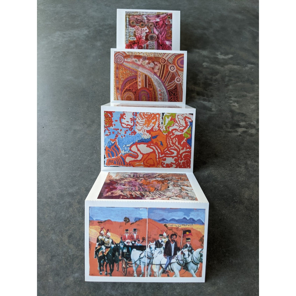 A front view of the vibrant concertina postcards showcases the different images on each side from various Iwantja Arts artists. 
