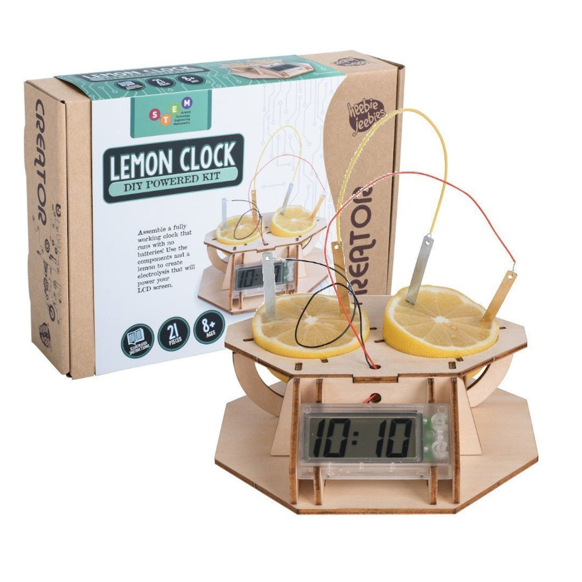 Image featuring the fully build timber lemon clock in the foreground with it's box packaging behind it