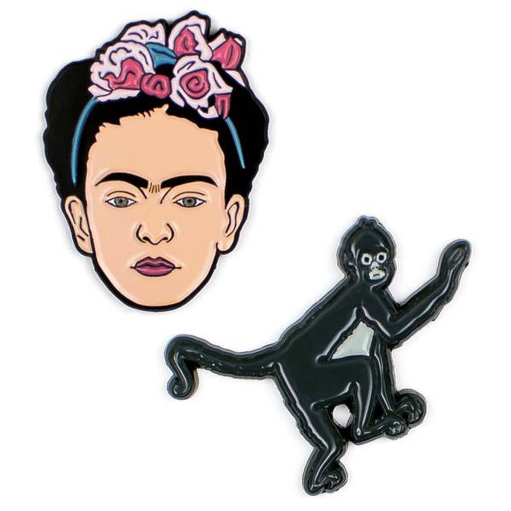 A set of two Enamel pins. One is a portrait of Frida Kahlo, the other her Pet Monkey