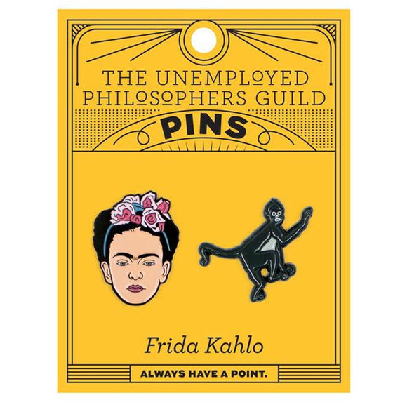 A set of two Enamel pins. One is a portrait of Frida Kahlo, the other her Pet Monkey